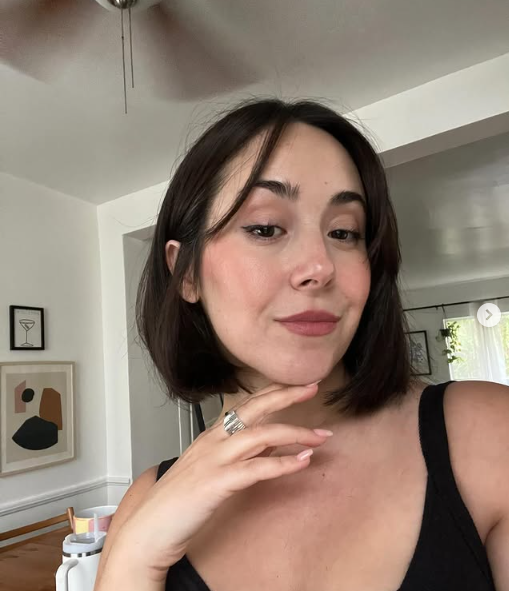 a woman taking a selfie