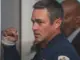 Kelly-Severide-examining-fire-records-Chicago-Fire-Season-14