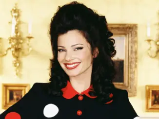 Fran Drescher stands with arms akimbo in character as Fran Fine 021826 1 45224155fd524cebba62484a075f9943